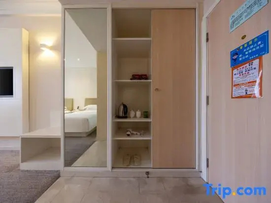Tian Long Hotel - Chambres