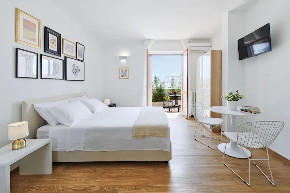 Standard Quadruple room with balcony and with city view