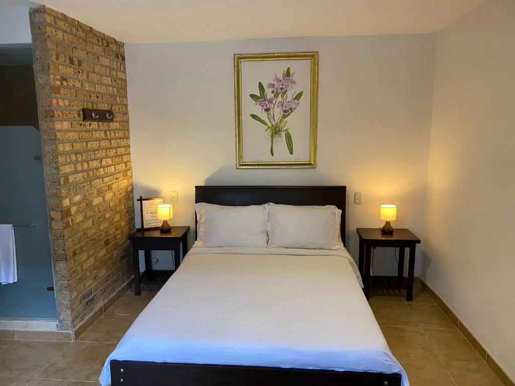 Casa Hotel Las Orquideas - Chambres