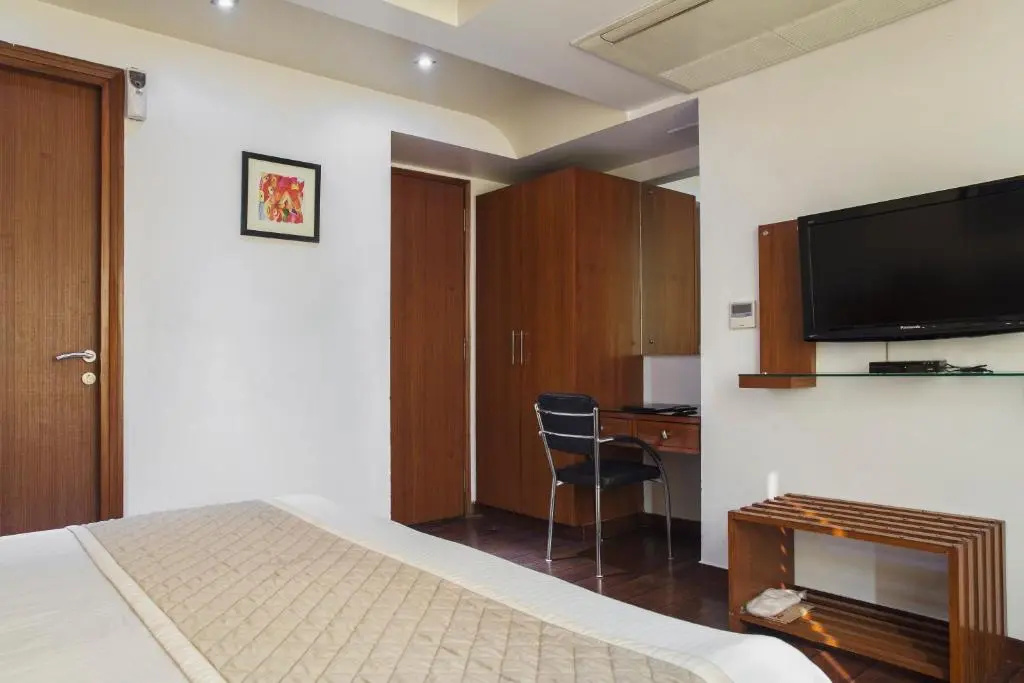 Trimrooms Palm D'or - Chambres