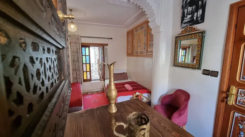 Standard Quadruple room with courtyard view