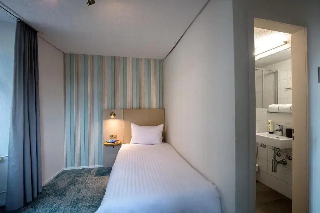 Hotel Krone by bsmart - Chambres
