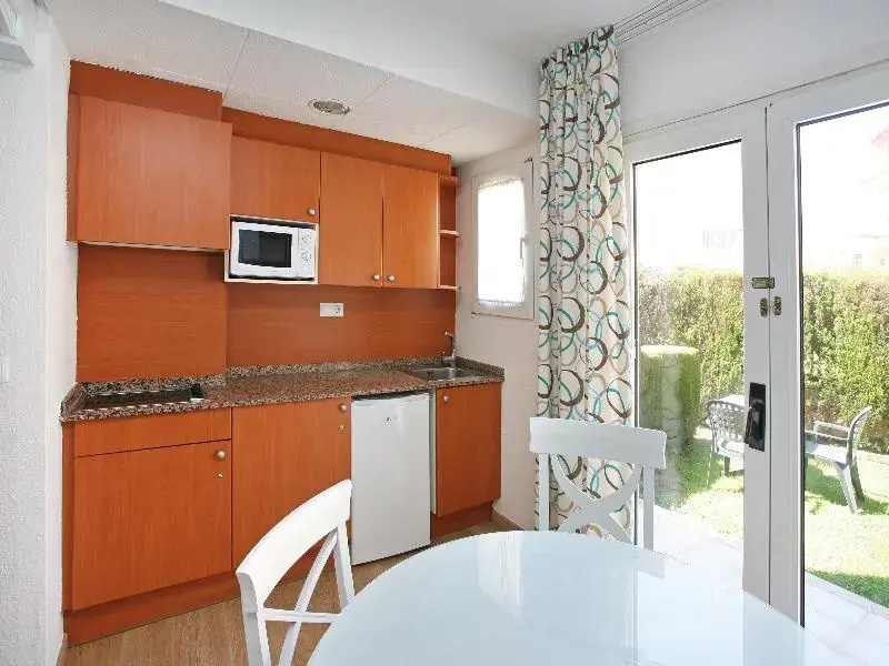 Apartamentos Turísticos Jardines del Plaza - Chambres