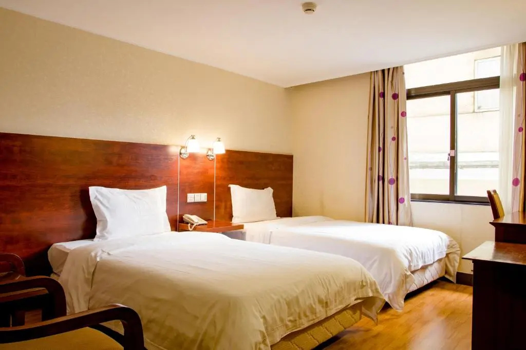 Guang Dong Hotel - Chambres