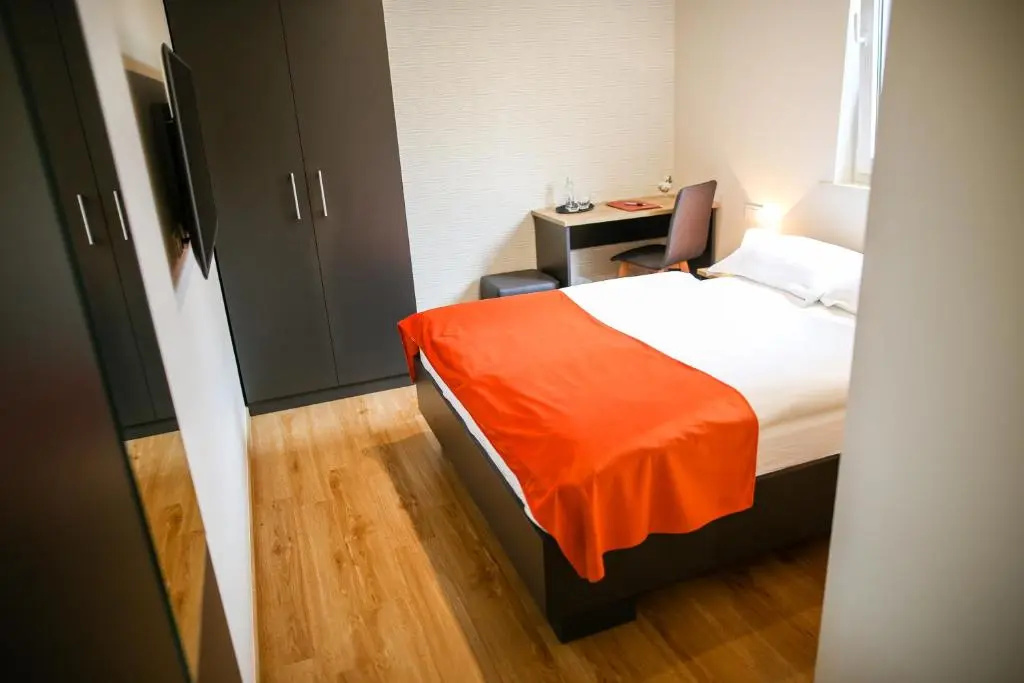 Ambient Hotel - Chambres