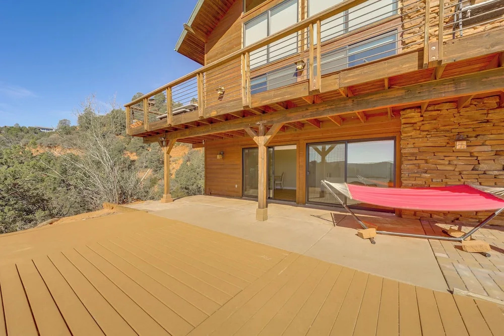 Pine Cabin w/ Wraparound Deck: 2 Mi to Trails!