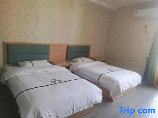 Xinxiang Hotel - Chambres