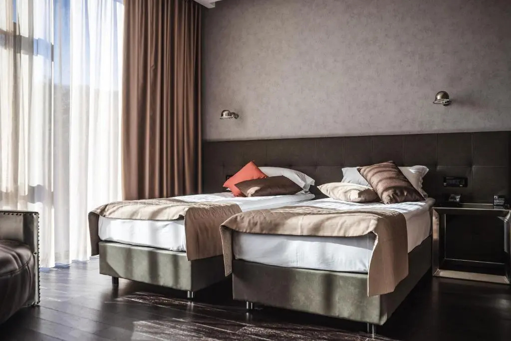 M1 Club Hotel - Chambres