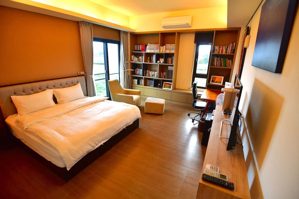 Standard Quadruple room with balcony and with garden view