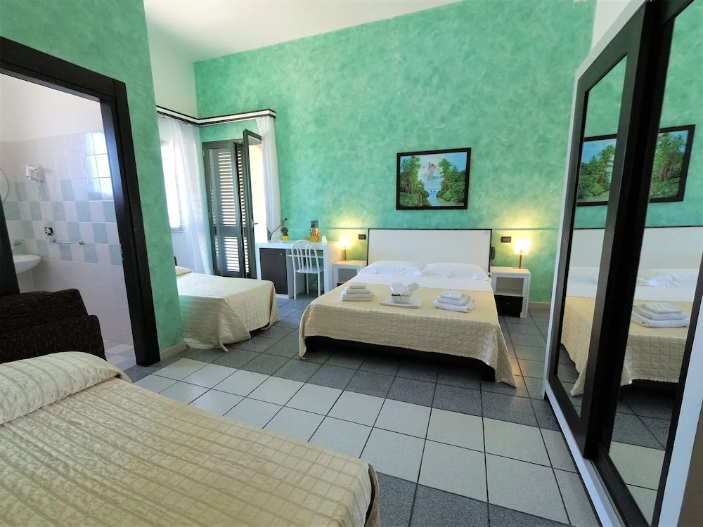 Standard Quadruple room with balcony and with sea view