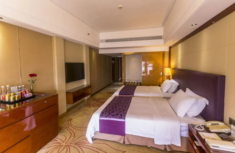 Manhattan Kinlen Hotel - Shishi - Chambres