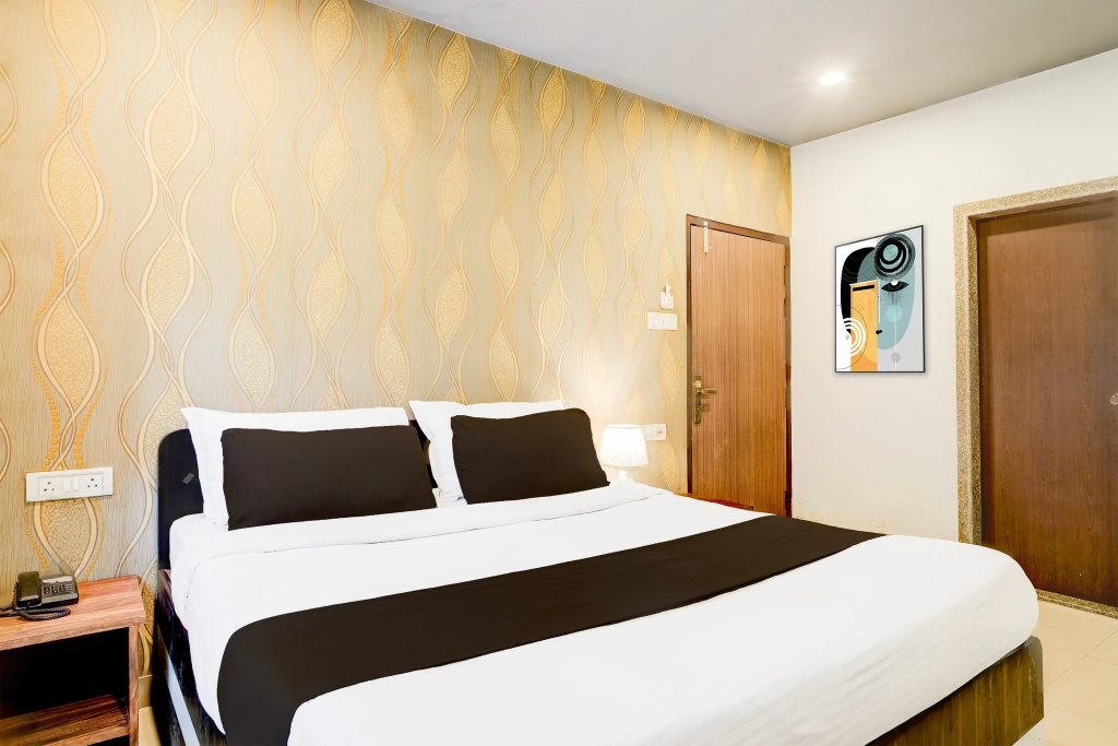 OYO Premium Beltola Tiniali - Chambres
