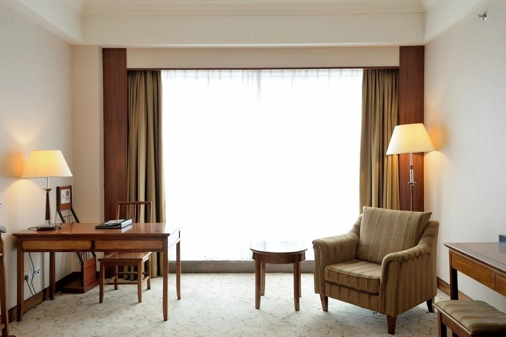 Gladden Hotel Shilong - Chambres