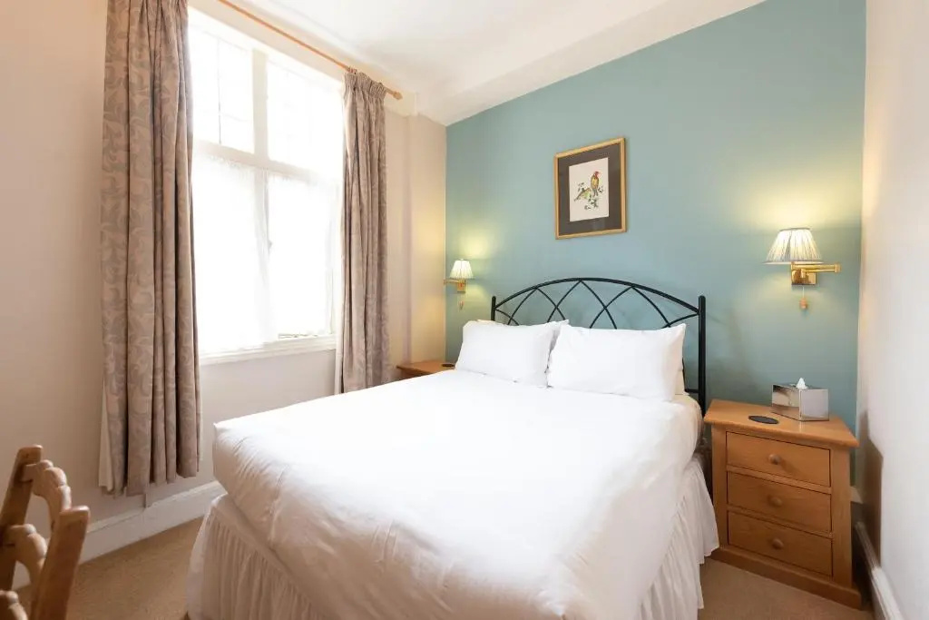 Corinium Hotel & Restaurant - Chambres