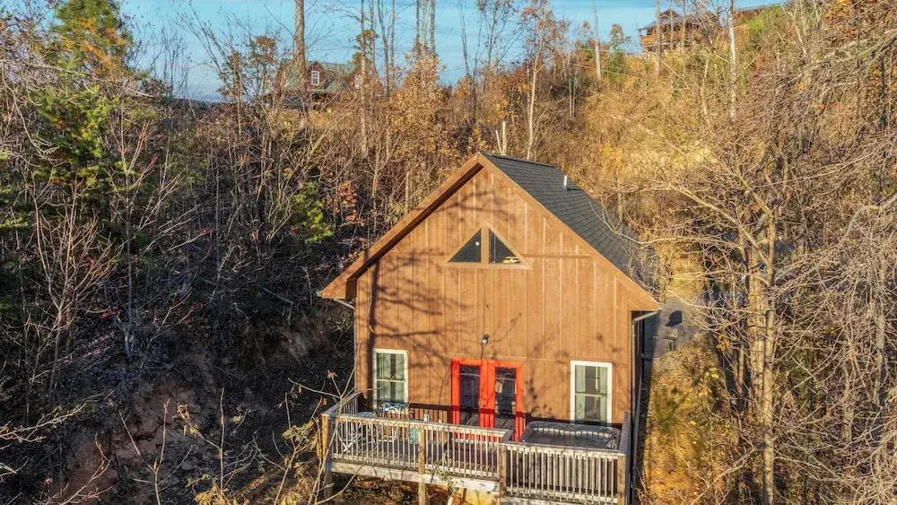 Hot Tub, Game Loft, Open Living, Minutes to Downtown Gatlinburg Whisper Cabin by Avantstay