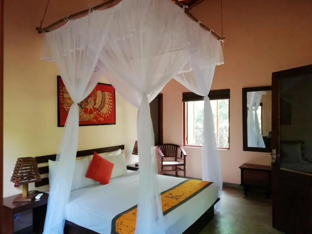 Deluxe Double Bungalow with balcony and with garden view full double bed