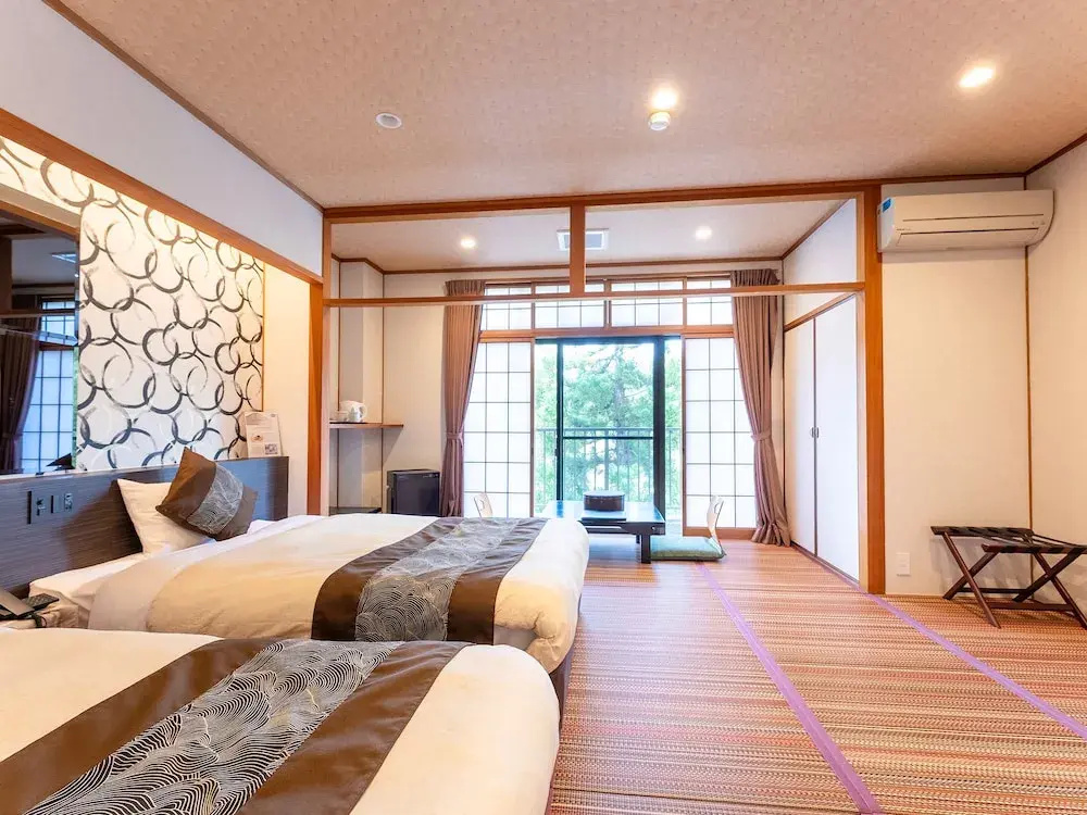 Livemax Resort Yuhigaura Kitu Onsen - Chambres