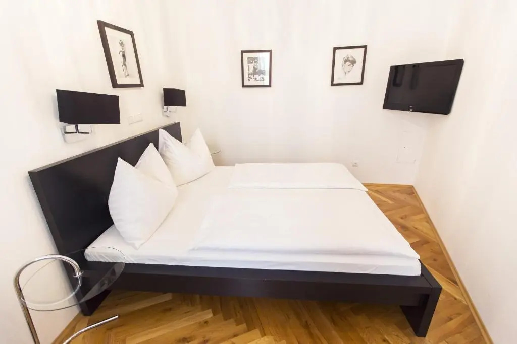 Carlton Suites - Chambres
