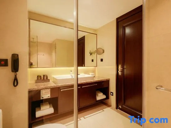 Sky World Hotel Qingdao - Chambres