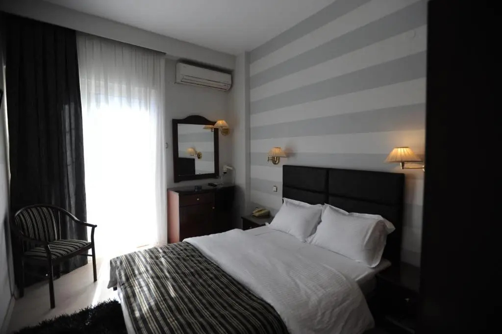 Lingos Hotel - Chambres