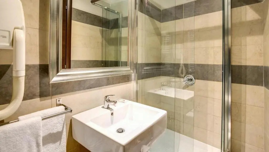 The Strand Hotel - Chambres