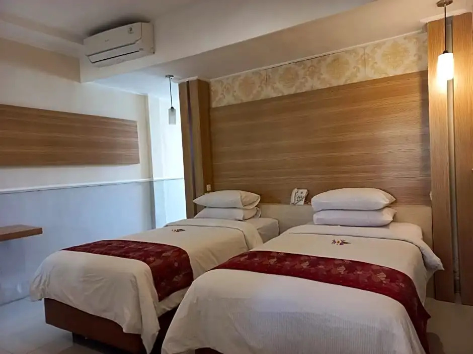 Bali Taman Lovina Resort and Spa Suites - Chambres