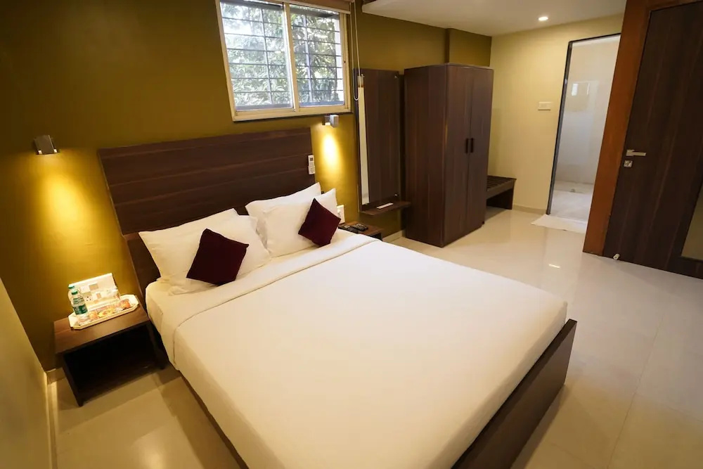 Metropolis Hotel - Chambres