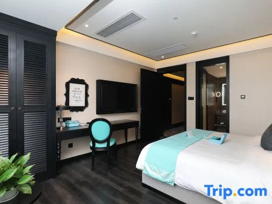 Xinliyuan Hotel - Chambres