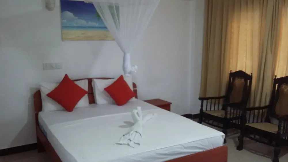 Oasis Beach Resort - Chambres