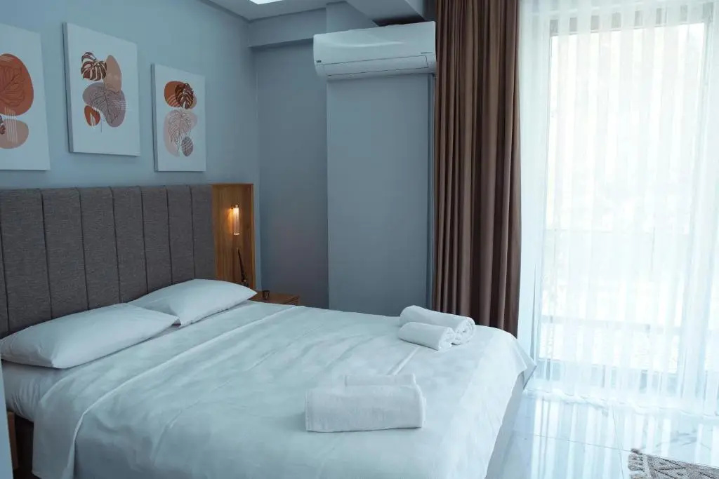 Standard Quadruple room with garden view