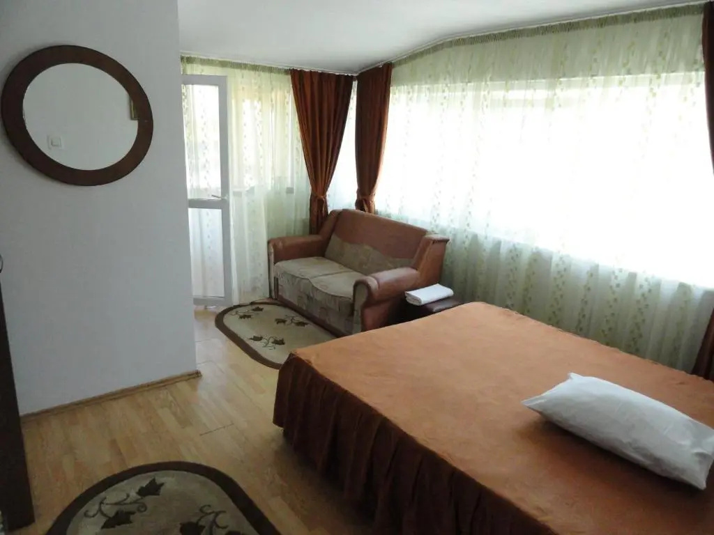 Pensiune Restaurant Avangarde - Chambres