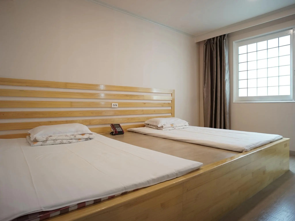 Apple Hotel - Chambres