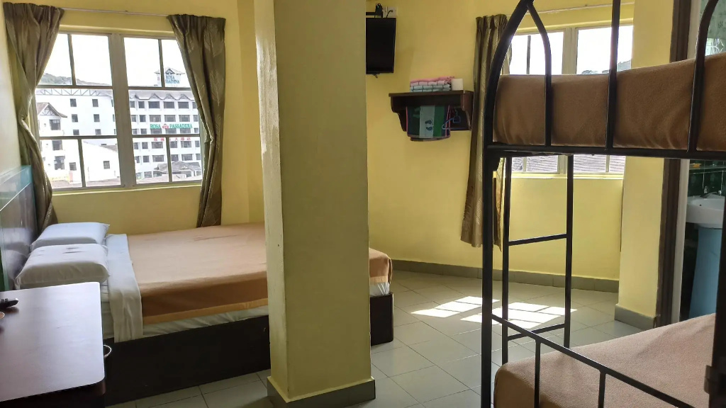 Ria Cameron Hotel - Chambres