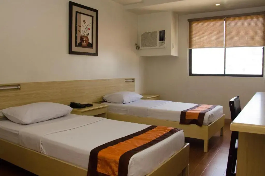 M Suites Hotel - Chambres