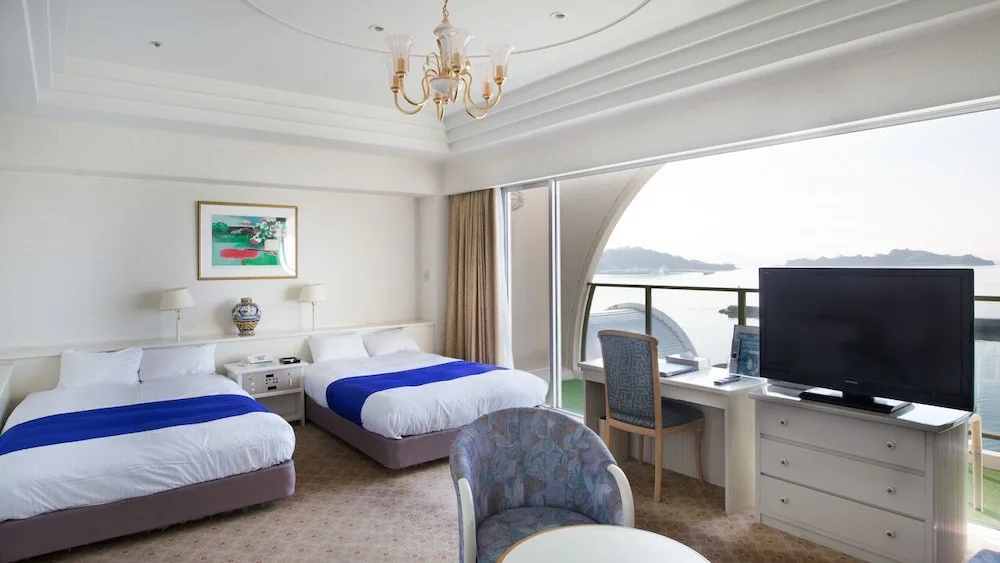 Deluxe Quadruple room with balcony