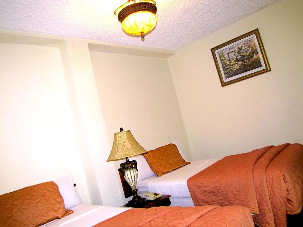 Hotel Tropico Inn - Chambres