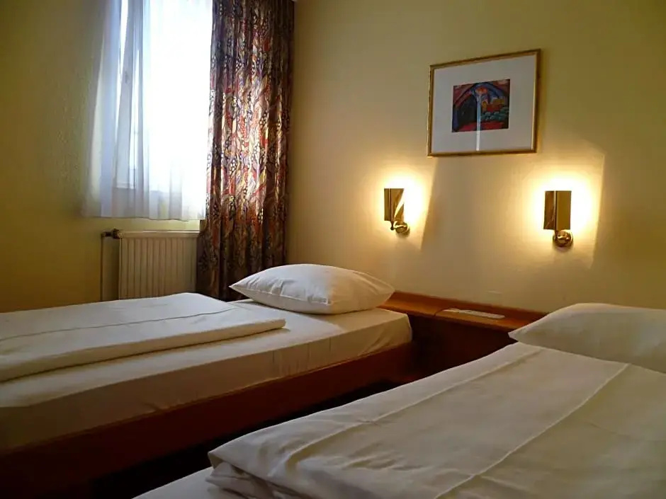 Hotel Mondial - Chambres