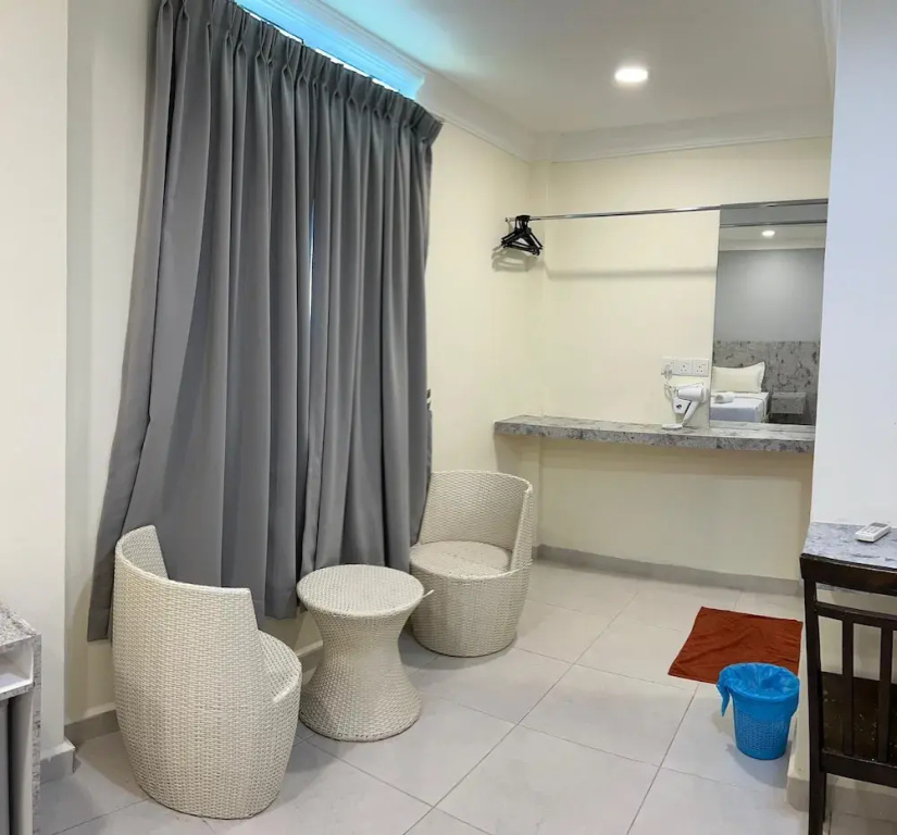 Standard Triple room with garden view