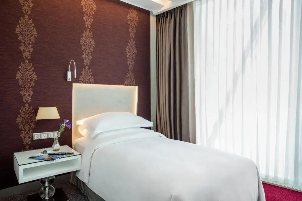 Burgu Arjaan by Rotana Hotel - Chambres