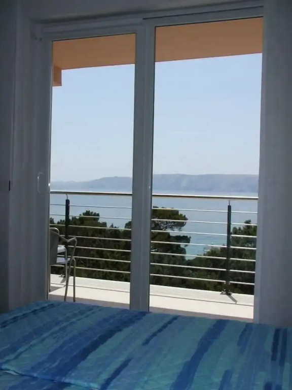 Standard Double room with balcony and beachfront full double bed