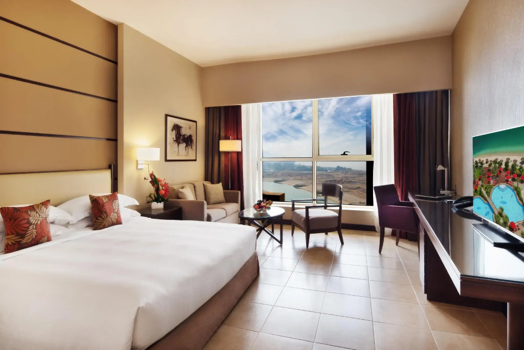 Khalidiya Palace Rayhaan by Rotana Hotel - Chambres
