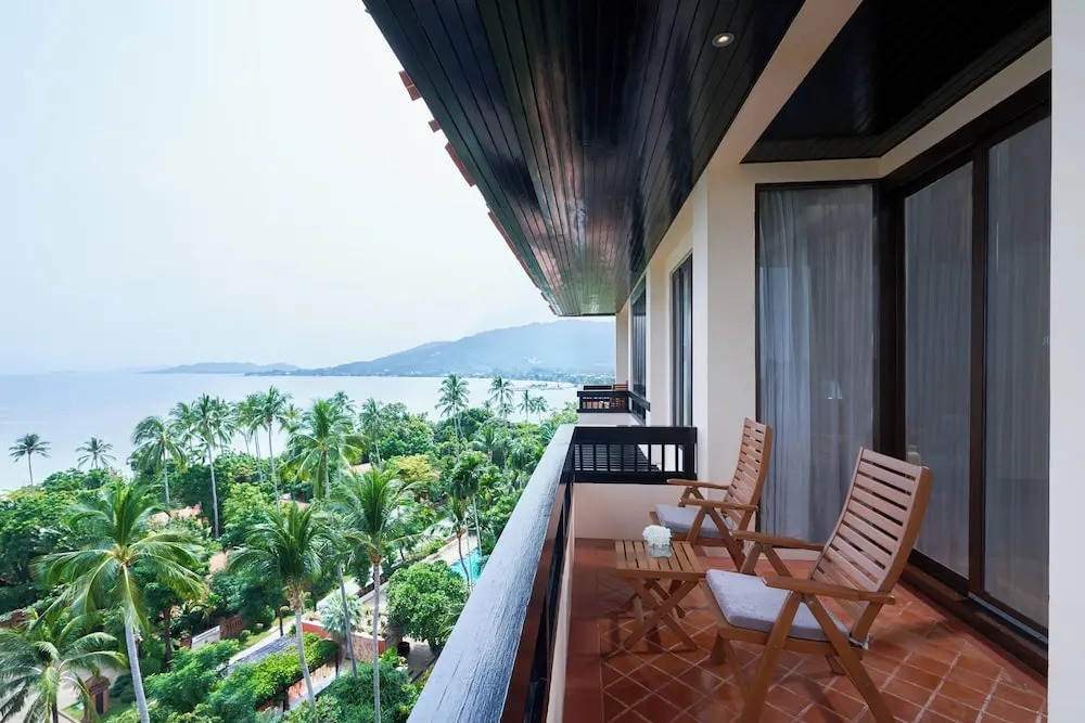 Семейный люкс с 2 комнатами seafront двуспальная кровать в Renaissance Koh Samui Resort & Spa