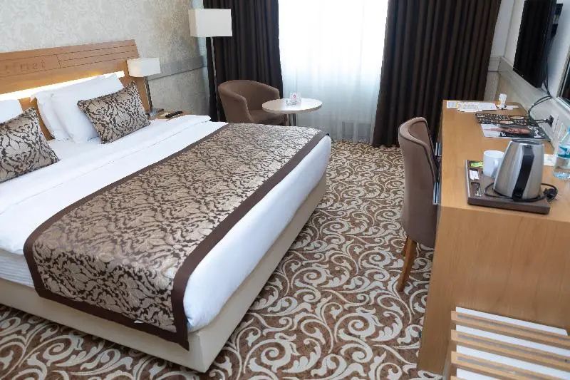 Grand Itimat Hotel - Chambres