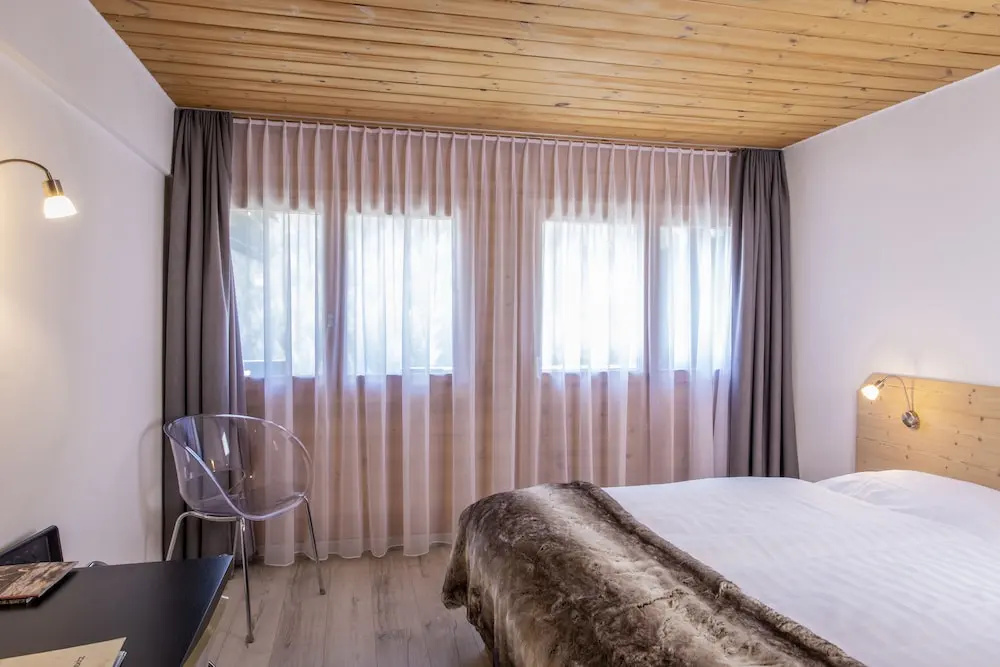 Hôtel Alpina - Chambres