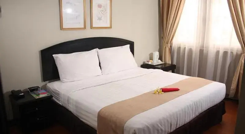 Puri Denpasar Hotel - Chambres
