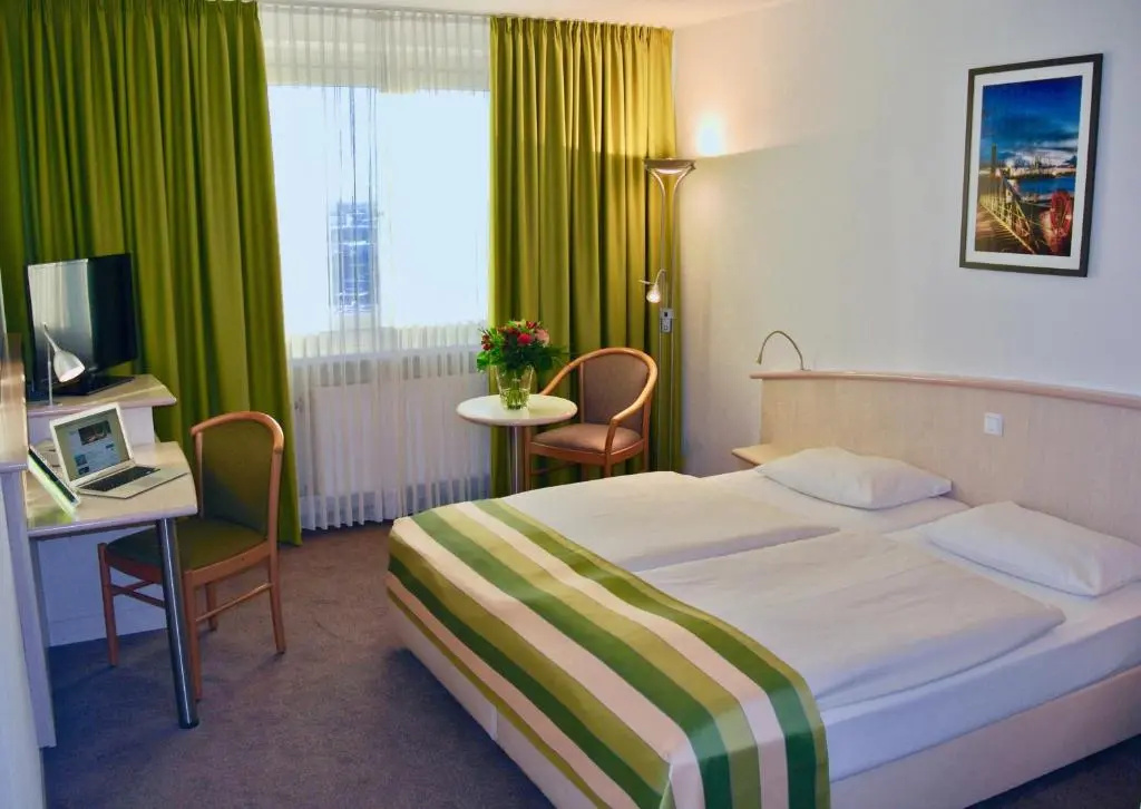 Panorama Inn Hotel und Boardinghaus - Chambres