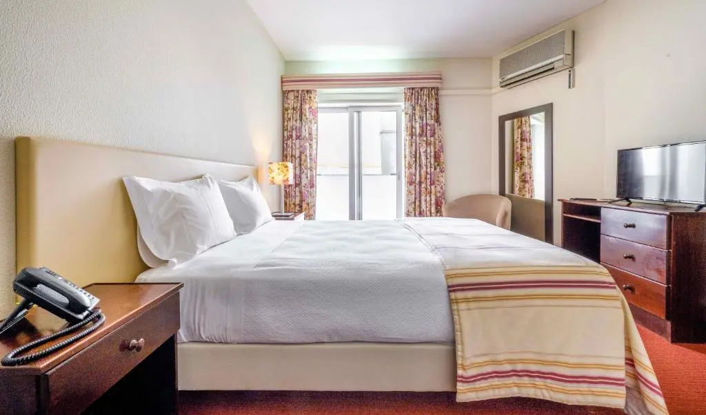 Católica Hotel - Chambres