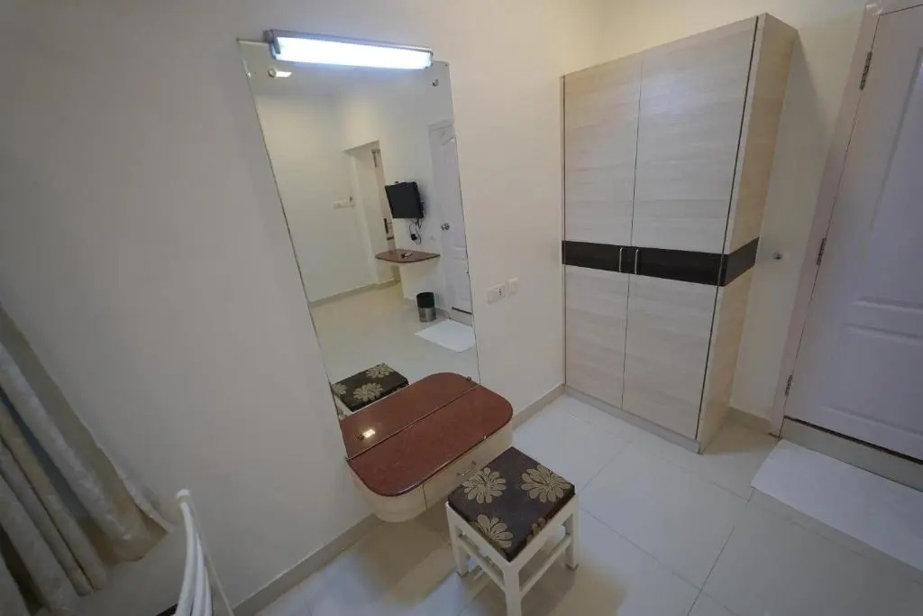 Hotel Palmyra Grand Inn - Chambres