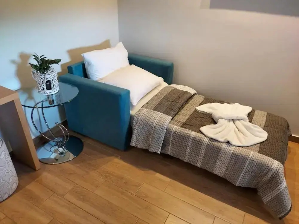 Deluxe Triple room with balcony and with sea view