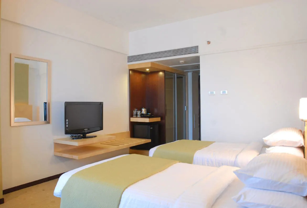 Peninsula Grand Hotel - Chambres